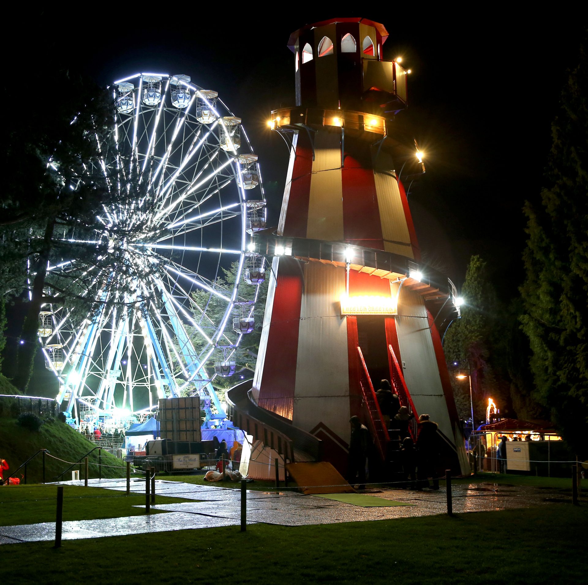 Winter festival with illuminated Ferris wheel